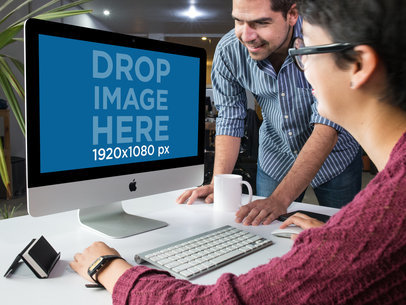 Man and Woman Working at the Office with an iMac Template a16265