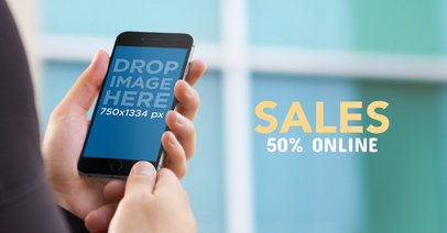 Facebook Ad - Business Man Holding an iPhone 6 Outside the Office a16553